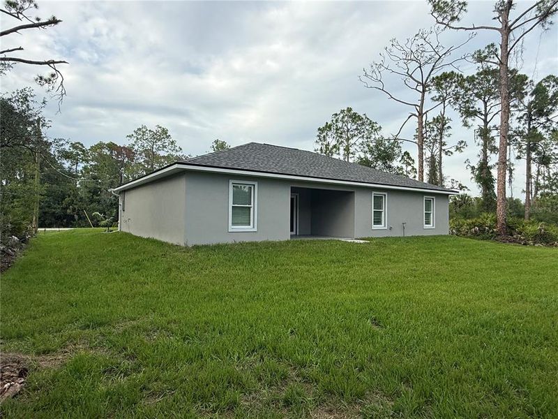 Exterior details and patio area of a home in , Port Charlotte (Image 3).