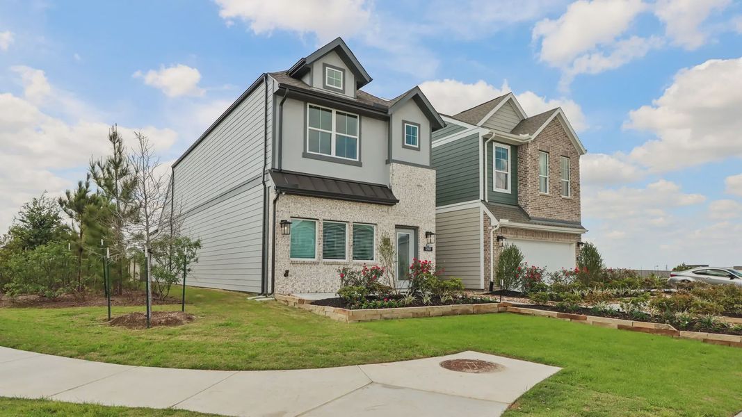 Representative exterior photo of a completed home built from the Versailles by Chesmar Homes in Kresston Chateau, Montgomery, TX (Image 23). Representative exterior photo of a completed home built from the Versailles by Chesmar Homes in Kresston Chateau, Montgomery, TX (Image 23).