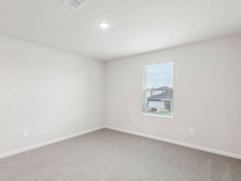 Spacious, unfurnished interior of a new home in River Glen, Angier (Image 10).