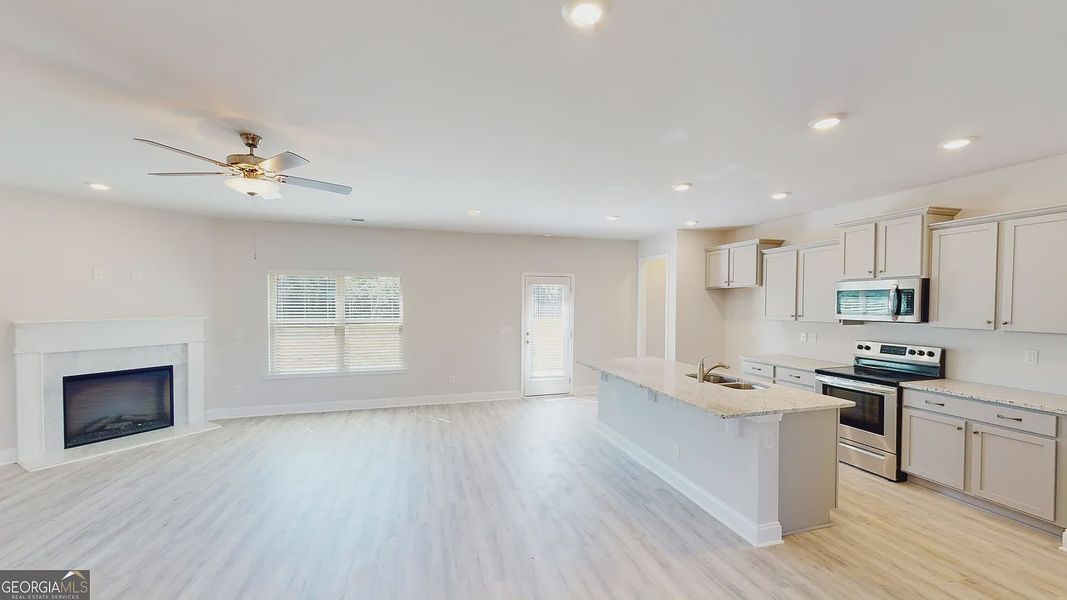 Furnished interior view inside a new home in Holliday Pass, Griffin (Image 7).