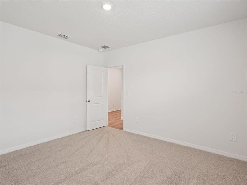 Spacious, unfurnished interior of a new home in Salt Meadows - Classic Series, Parrish (Image 11).