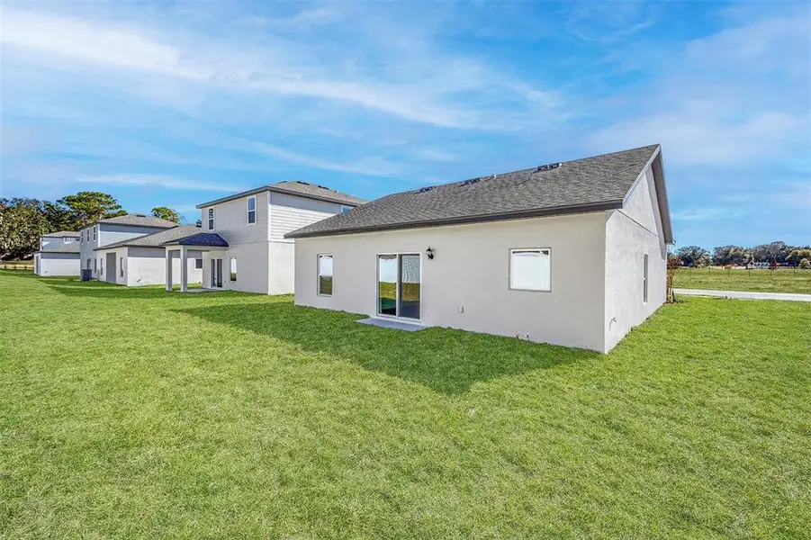 Exterior details and patio area of a home in Tula Parc, Astatula (Image 2). Exterior details and patio area of a home in Tula Parc, Astatula (Image 2).