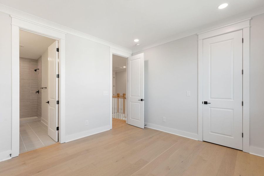Spacious, unfurnished interior of a new home in Rivercroft, Awendaw (Image 24).