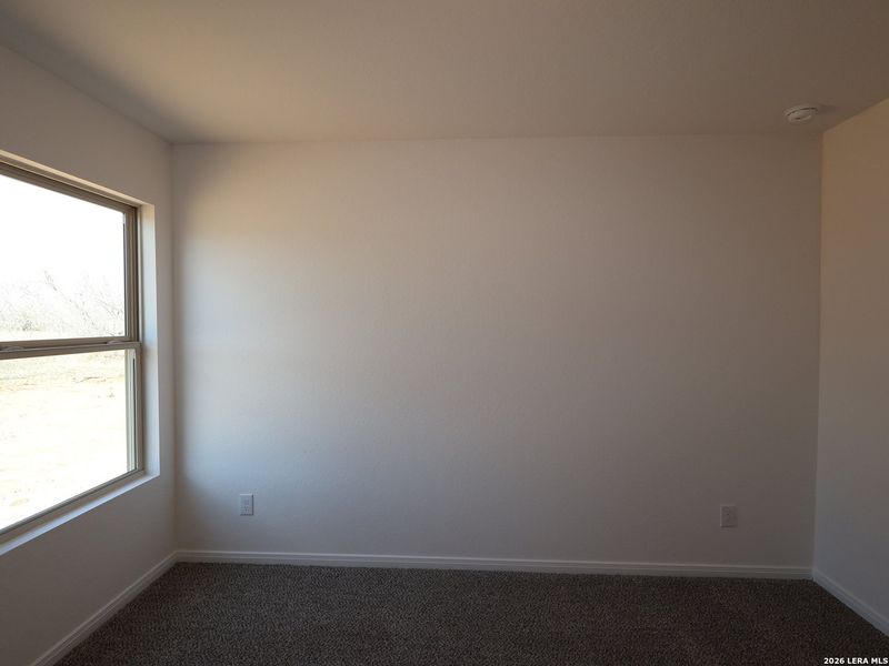 Spacious, unfurnished interior of a new home in Chaparral Ranch, Floresville (Image 20).