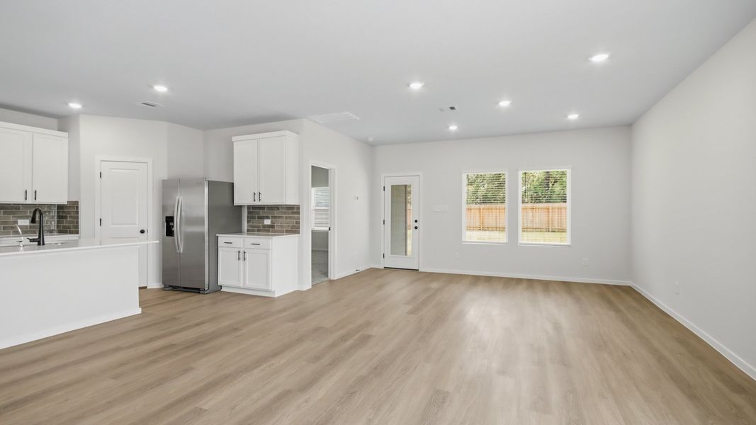 Representative unfurnished interior of a home built from the Perry by D.R. Horton in New Waverly Station, New Waverly (Image 13).