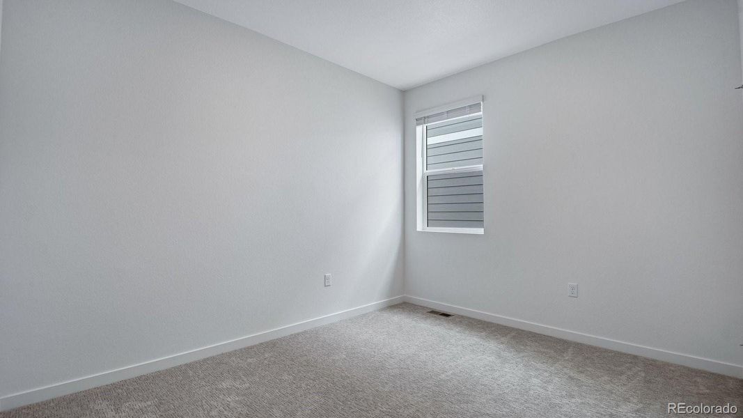 Spacious, unfurnished interior of a new home in Trails at Crowfoot, Parker (Image 37).