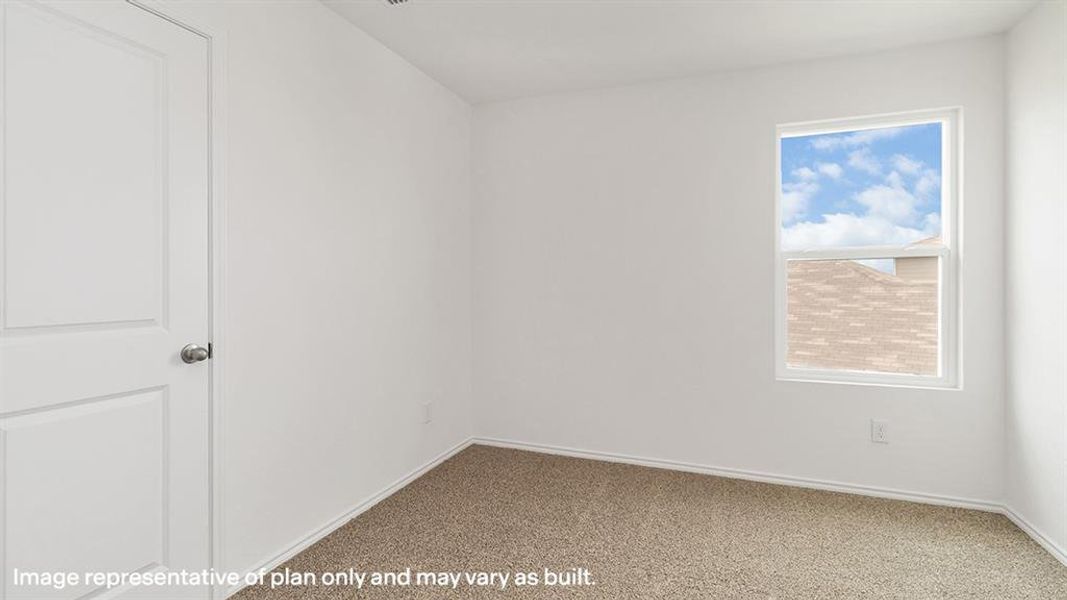 Unfurnished room featuring carpet floors and baseboards
