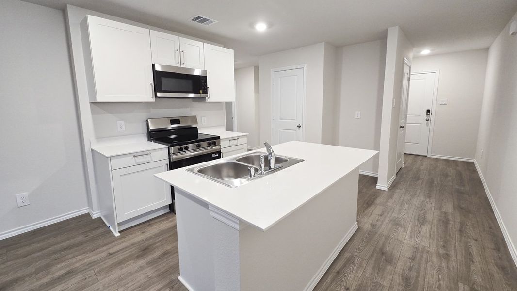Furnished interior view inside a new home in Leonard Crossing, Leonard (Image 4).