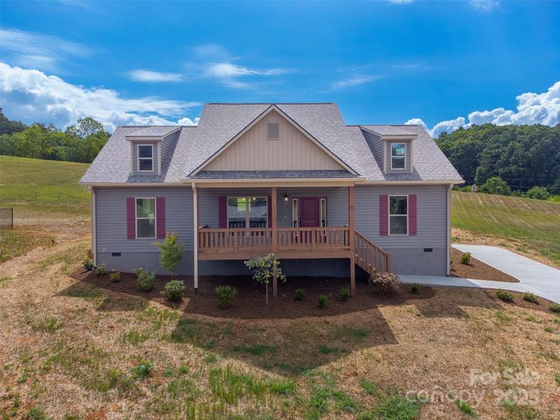 Front exterior of a new home in , Franklin, NC, highlighting curb appeal (Image 22).