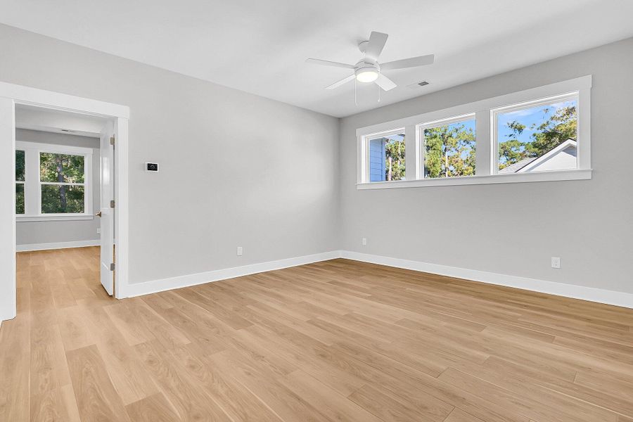 Spacious, unfurnished interior of a new home in Hidden Ponds Reserve, Awendaw (Image 17).