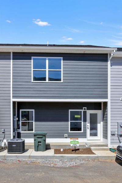 Exterior details and patio area of a home in The Parks of Mill Town, Chattanooga (Image 3).