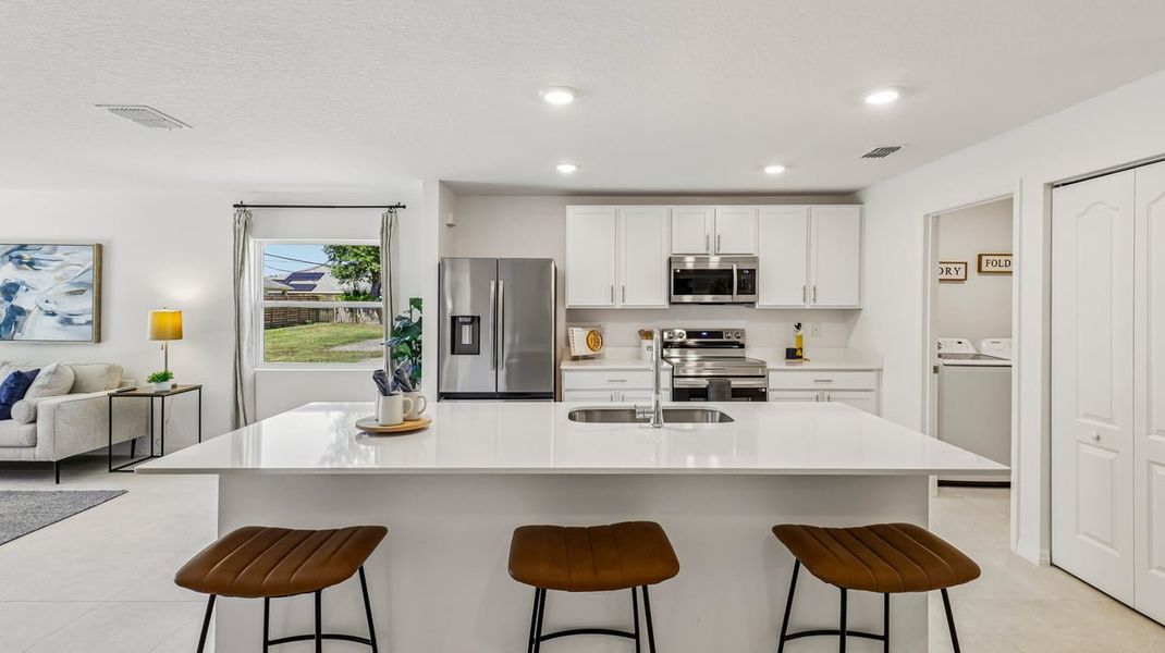 Representative furnished interior of a home built from the Marigold by Maronda Homes in Vero Lake Estates, Vero Beach (Image 10).