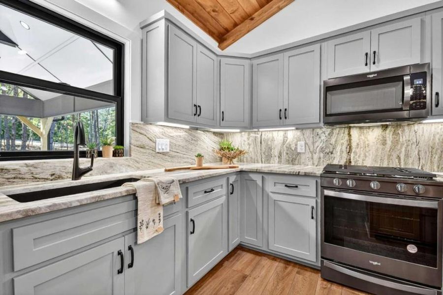 Furnished interior view inside a new home in , McCaysville (Image 12).