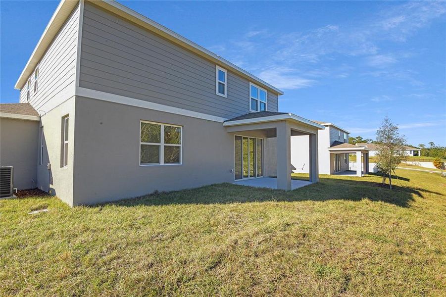 Exterior details and patio area of a home in Seasons at Wekiva Ridge, Mount Dora (Image 3).