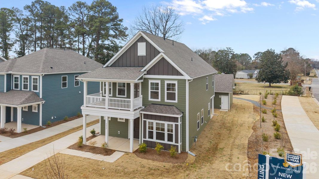 Front exterior of a new home in Arbor Village, Matthews, NC, highlighting curb appeal (Image 17).