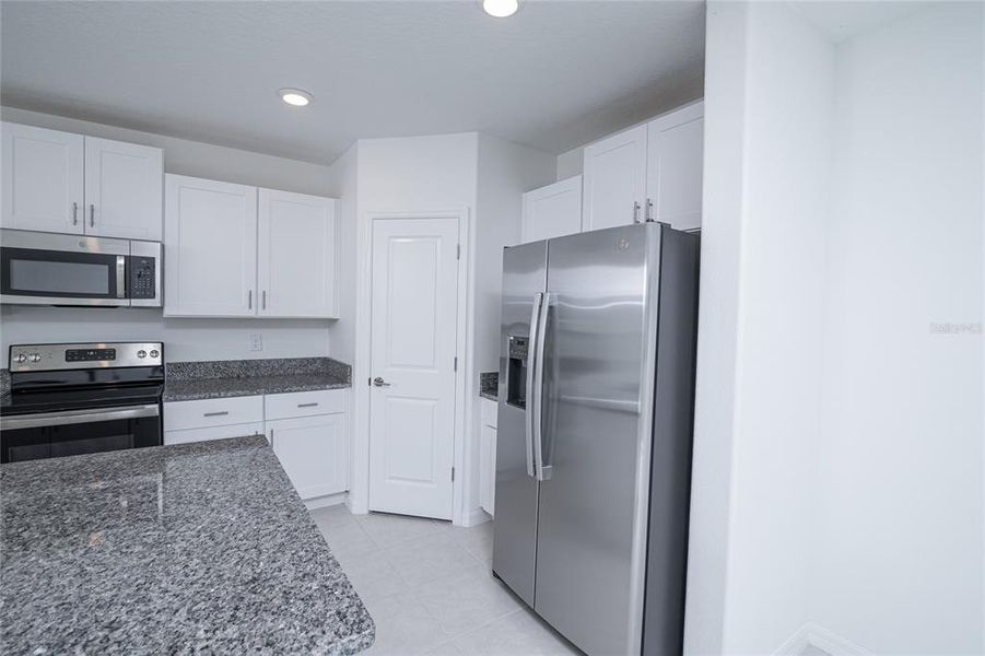 Furnished interior view inside a new home in Saddle Creek Preserve: The Manors II, Lakeland (Image 14).