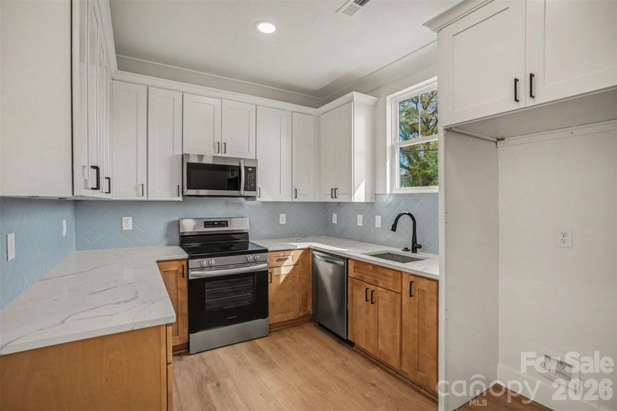 Furnished interior view inside a new home in , Charlotte (Image 6). Furnished interior view inside a new home in , Charlotte (Image 6).