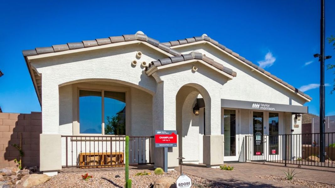 Representative exterior photo of a completed home built from the Champlain by Taylor Morrison in Mystic Discovery Collection, Peoria, AZ (Image 51). Representative exterior photo of a completed home built from the Champlain by Taylor Morrison in Mystic Discovery Collection, Peoria, AZ (Image 51).