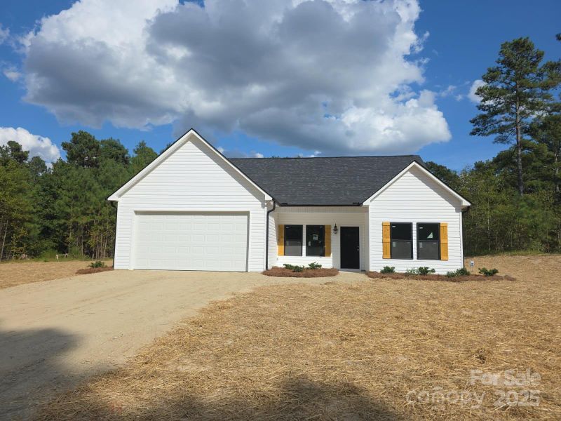 Front exterior of a new home in , Pageland, SC, highlighting curb appeal (Image 13).