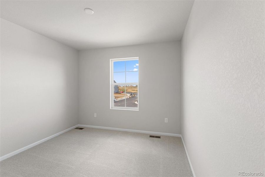 Spacious, unfurnished interior of a new home in The Legacy Collection at Talon Pointe, Thornton (Image 16).