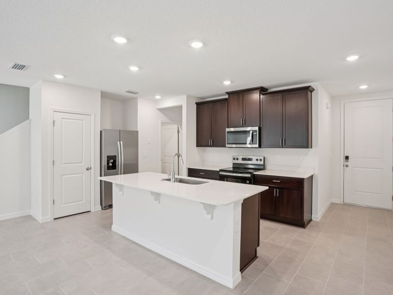 Furnished interior view inside a new home in The Meadow at Crossprairie Townes, St. Cloud (Image 4).