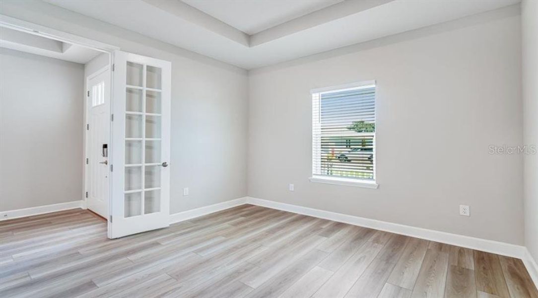 Spacious, unfurnished interior of a new home in The Cove at West Port, Port Charlotte (Image 23).