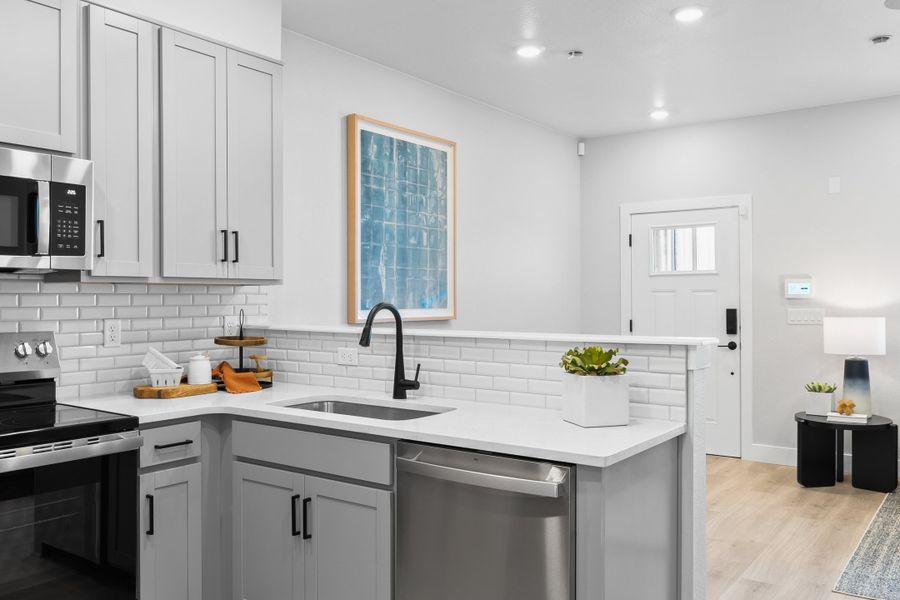Representative furnished interior of a home built from the Backcountry by Taylor Morrison in Trailstone Townhomes - The Westerly Collection, Arvada (Image 12).