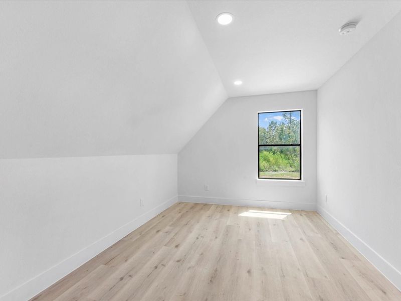 this room is a great spot for a movie room, Pilates studio, library. It has such cozy vibes!