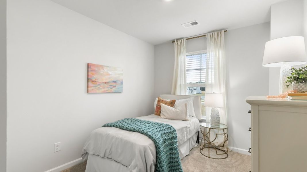 Furnished interior view inside a new home in The Towns at Blue Jay, Rincon (Image 22).