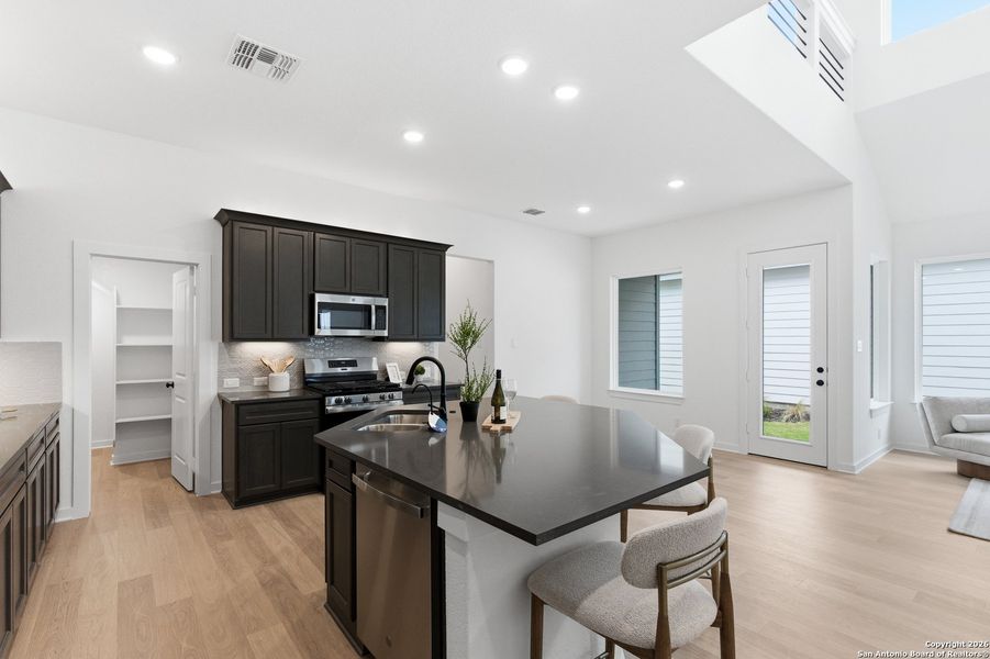 Furnished interior view inside a new home in The Crossvine, Schertz (Image 18).