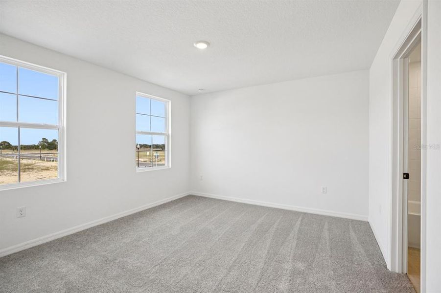 Spacious, unfurnished interior of a new home in Northlake at Ovation, Winter Garden (Image 32).