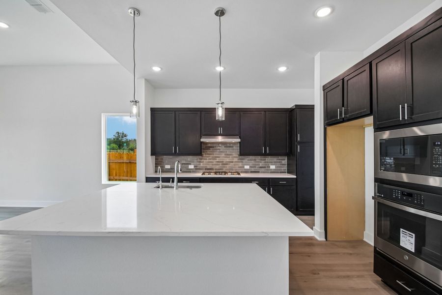 Furnished interior view inside a new home in Freedom at Anthem, Kyle (Image 3).