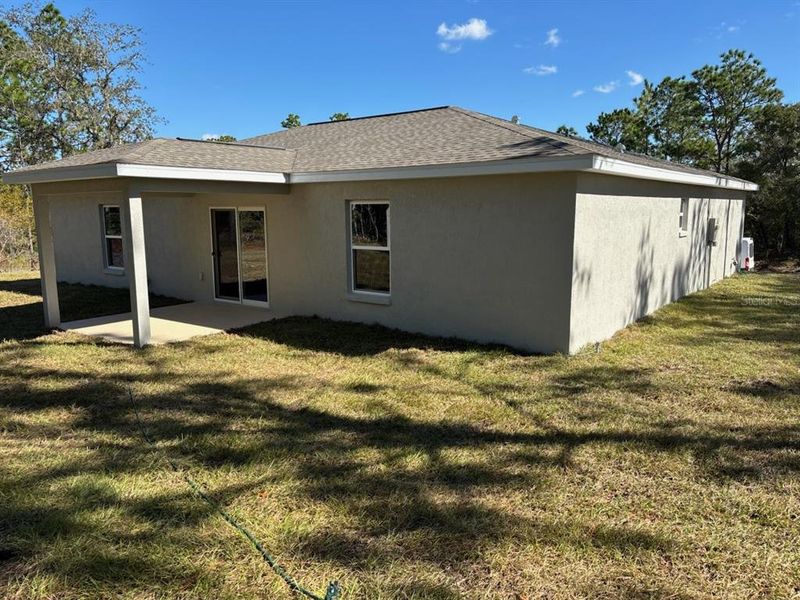 Exterior details and patio area of a home in , Citrus Springs (Image 19).