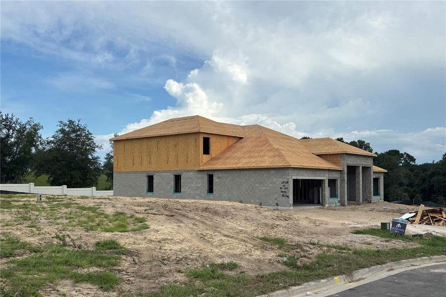 Front exterior of a new home in Wolf Lake Ranch, Apopka, FL, highlighting curb appeal (Image 6).