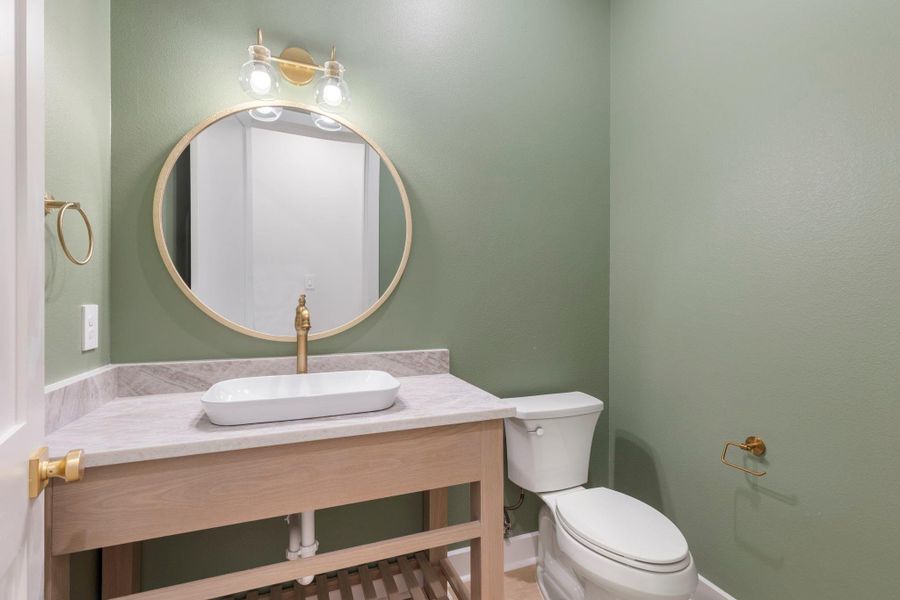 Powder room downstairs for convenience. Powder room downstairs for convenience.