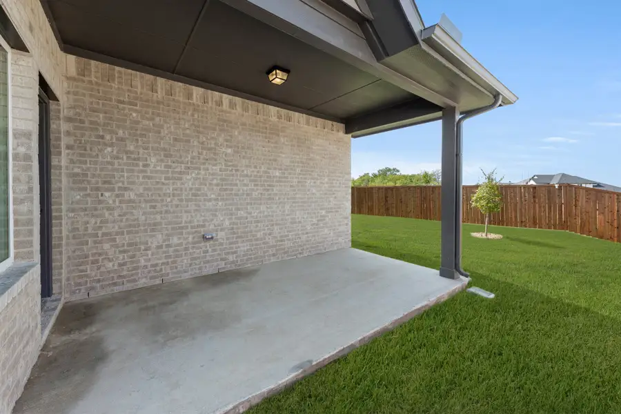 Representative exterior details of a home built from the Honor by Rockwell Homes in Creekside, Royse City (Image 42).