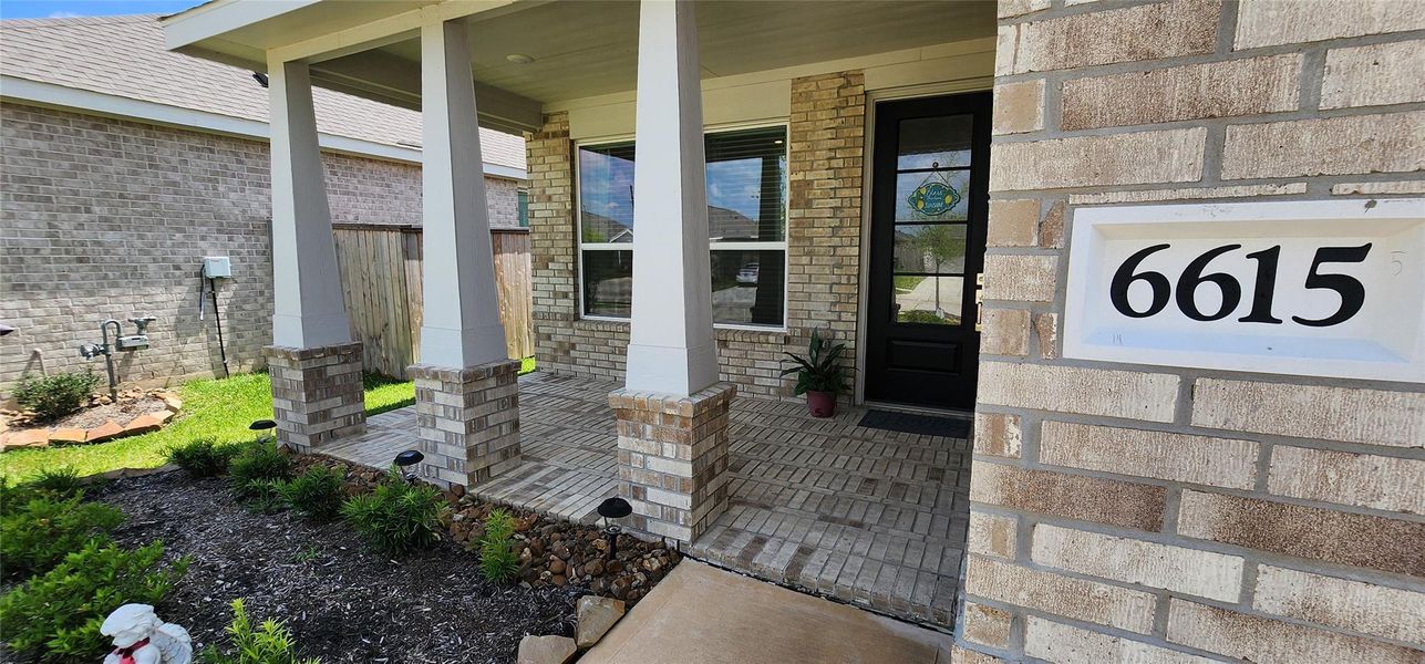 Exterior details and patio area of a home in Anniston, Katy (Image 3).
