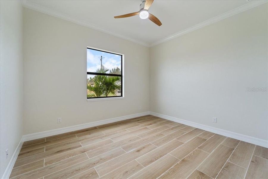 Spacious, unfurnished interior of a new home in , Port Charlotte (Image 21).