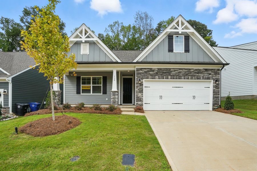 Front exterior of a new home in Villas at Prestwick, Mooresville, NC, highlighting curb appeal (Image 1). Front exterior of a new home in Villas at Prestwick, Mooresville, NC, highlighting curb appeal (Image 1).