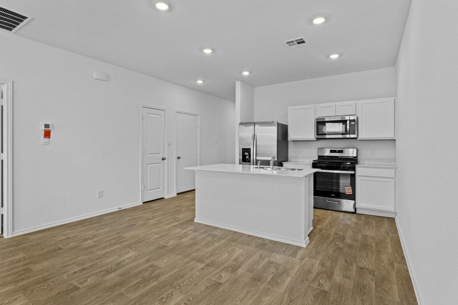 Furnished interior view inside a new home in Wayside, Uhland (Image 8).