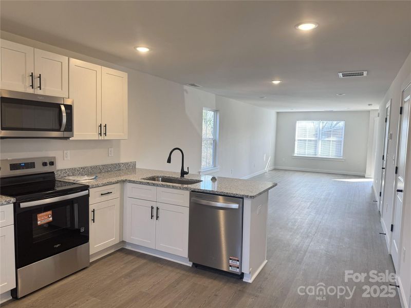 Furnished interior view inside a new home in , Hickory (Image 8).