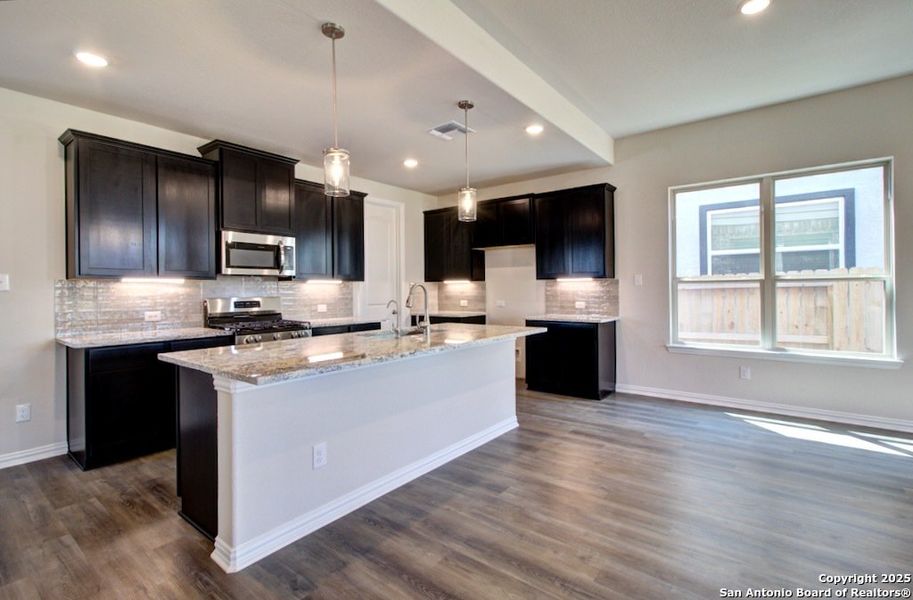 Furnished interior view inside a new home in Stream Waters, Seguin (Image 4).