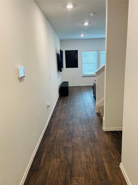 Long Foyer Hallway with wood-finish flooring. Long Foyer Hallway with wood-finish flooring.