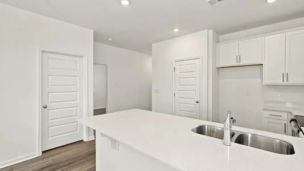 Furnished interior view inside a new home in The Lakes at North Glynn, Brunswick (Image 9).