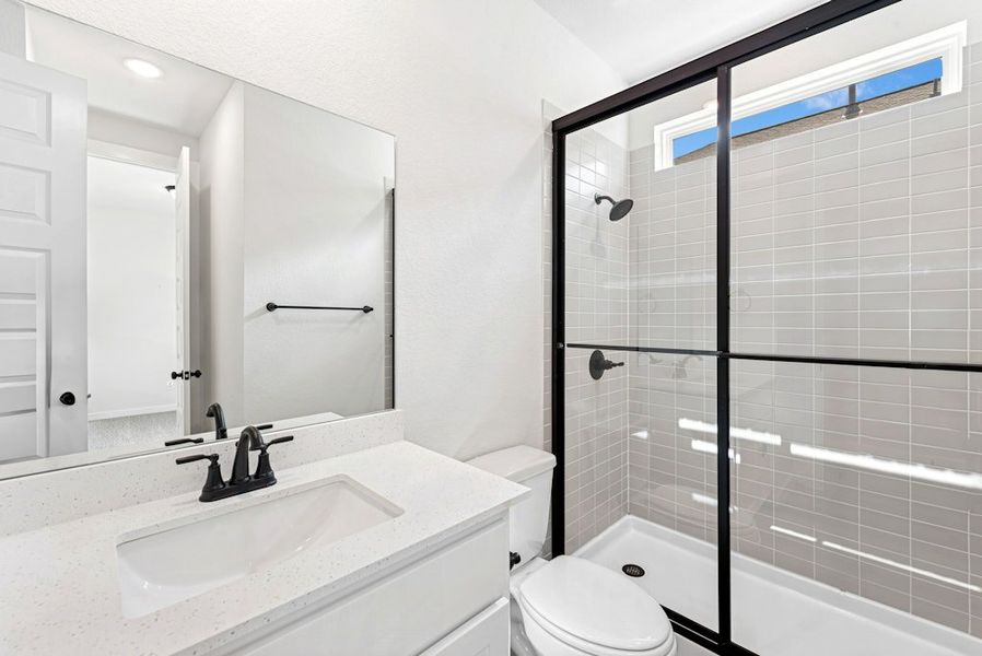 Furnished interior view inside a new home in University Heights, Round Rock (Image 16).