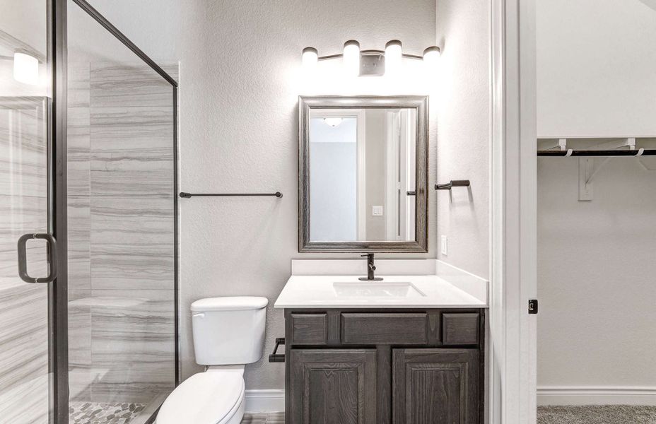 Representative furnished interior of a home built from the 2870 by Ravenna Homes in The Woodlands Hills 65′, Willis (Image 17). Representative furnished interior of a home built from the 2870 by Ravenna Homes in The Woodlands Hills 65′, Willis (Image 17).