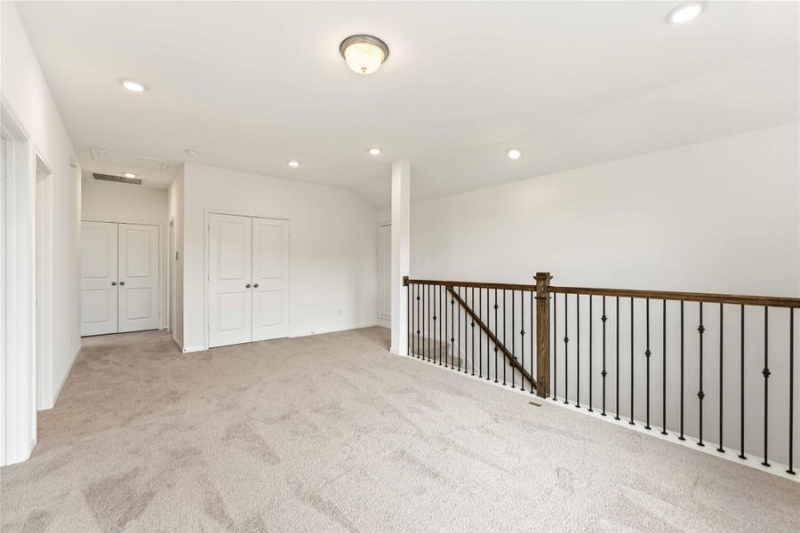 Spacious, unfurnished interior of a new home in Sunterra, Katy (Image 27).