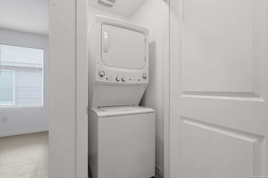 Furnished interior view inside a new home in Rose Valley, Converse (Image 12).