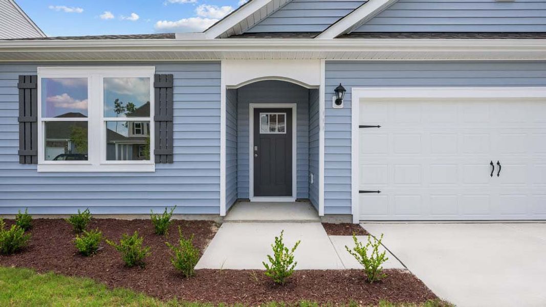 Exterior details and patio area of a home in West New Bern, New Bern (Image 3).