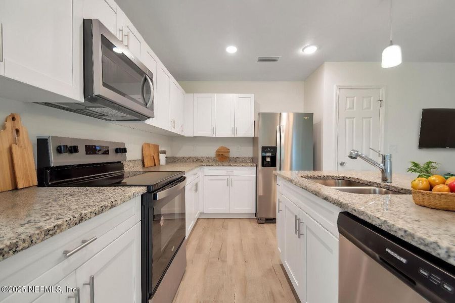 Furnished interior view inside a new home in , Jacksonville (Image 10). Furnished interior view inside a new home in , Jacksonville (Image 10).